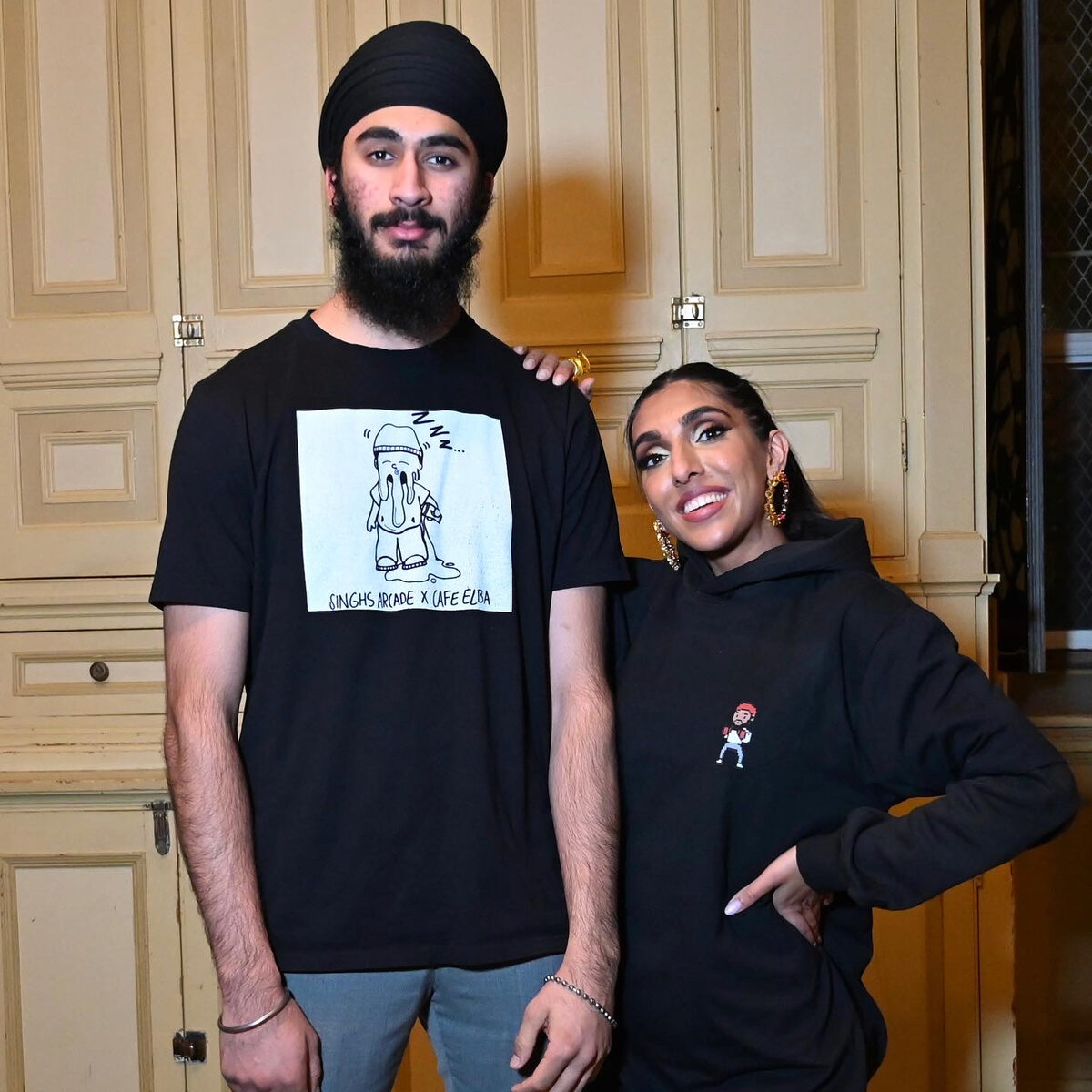 Two people wearing custom printed apparel from Singhs Print Montreal