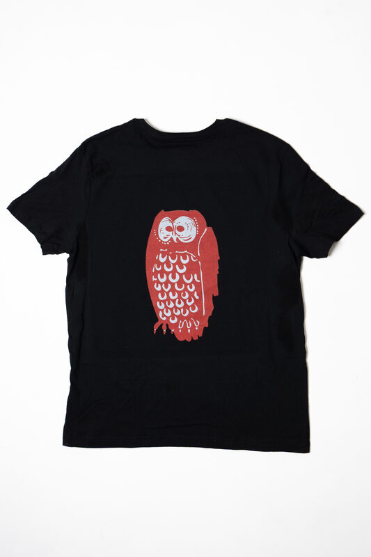 Red owl graphic on black tee